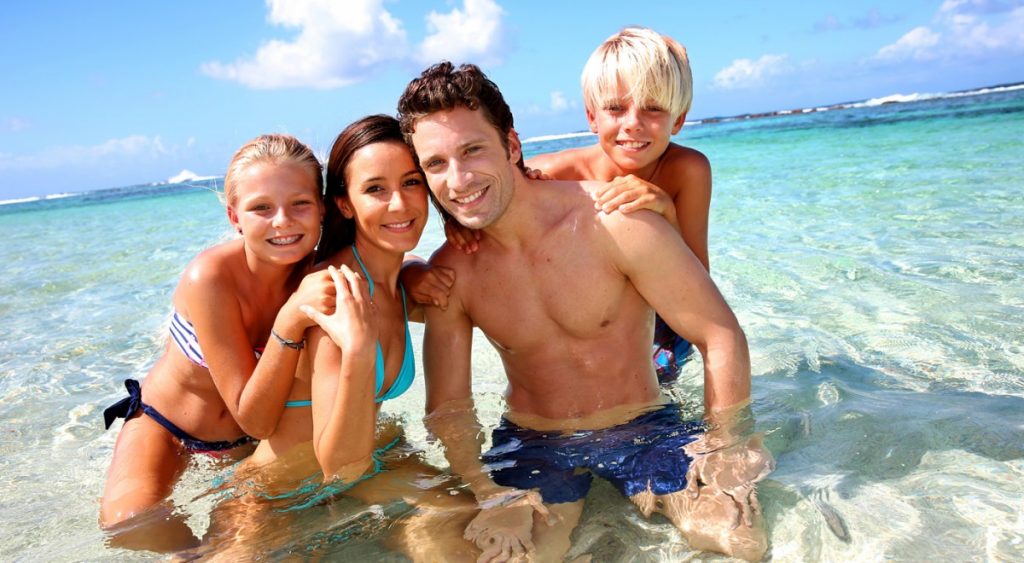 beach familyinwater 1400x770