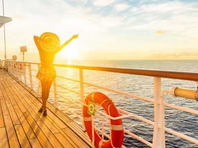 Woman on the deck of a boat on the water