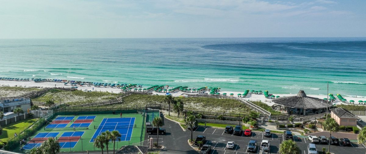 Arial view of the property & the beach. Tennis courts with ocean view. 