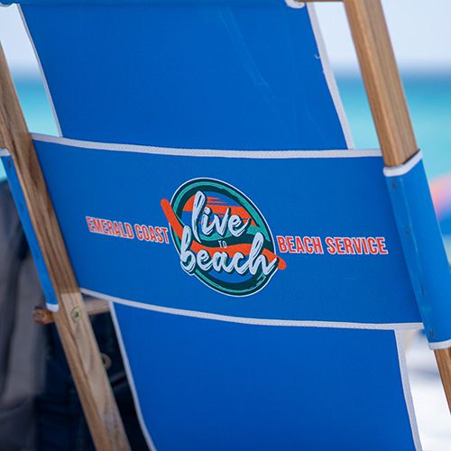 Live Beach logo on beach chair